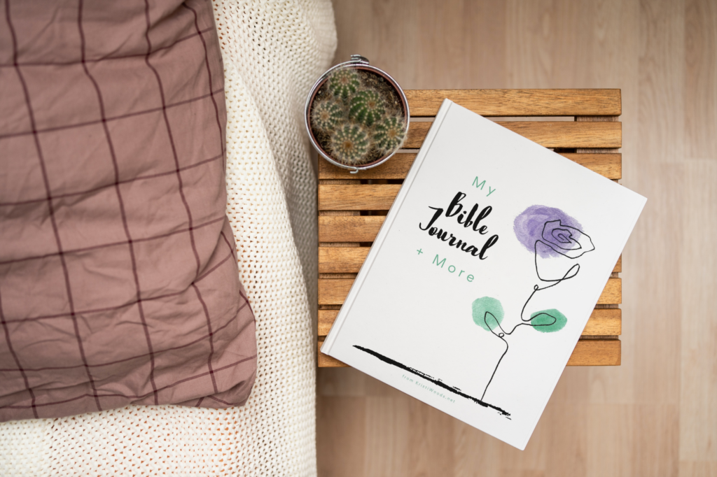 My Bible Journal + More printable Etsy product cover on a nightstand. Available in the Kristi Woods Studio at Etsy.