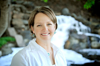 Picture of a woman in a white blouse