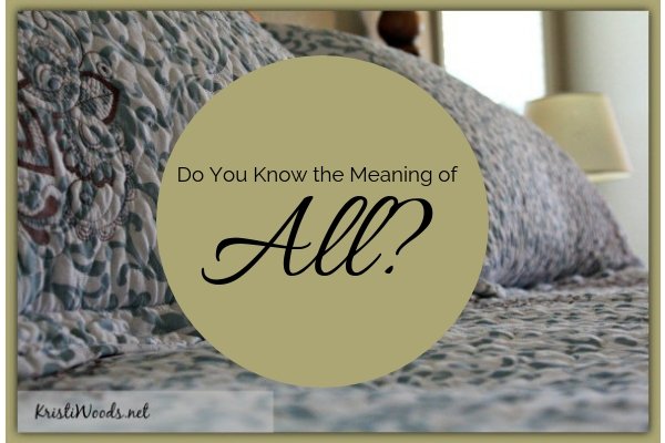A bedspread with the words Do You KNow the MEaning of All? written over it in a gold circle