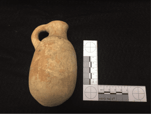 Small jug from ancient Israel on black background