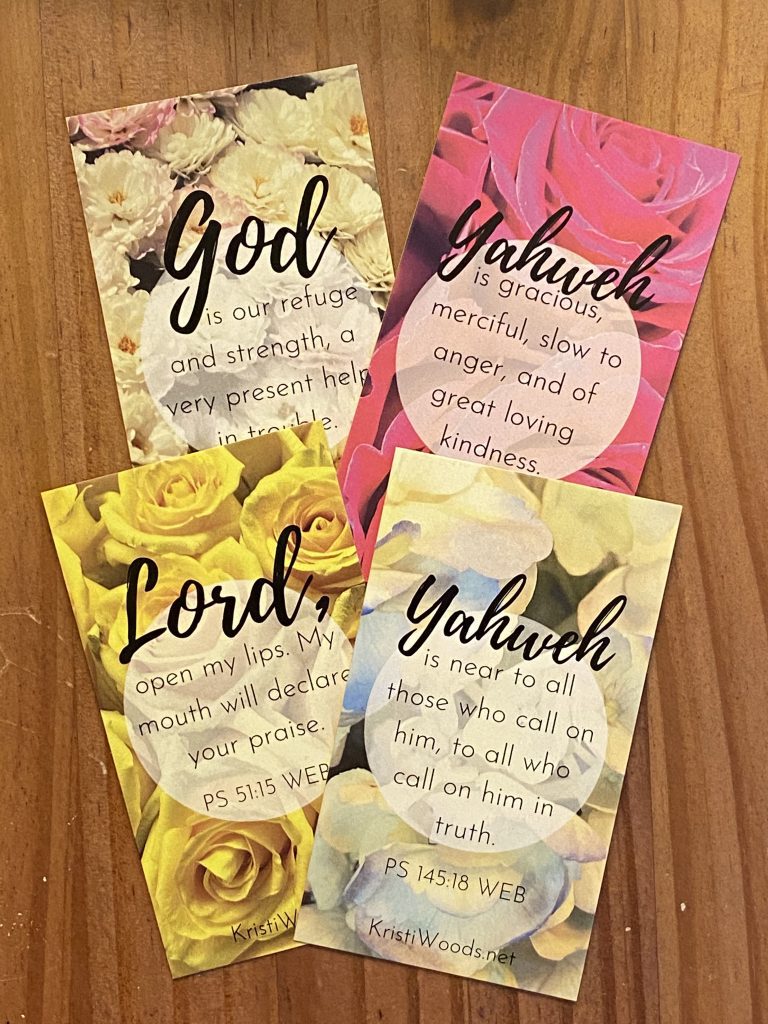 picture of four Bible verse cards with flowers in the backdrop