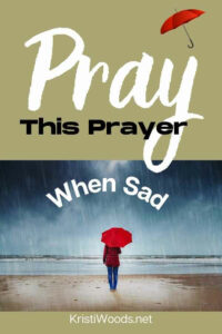 person walking with umbrella on rainy day, blog post title overhead for Pray This Prayer When Sad