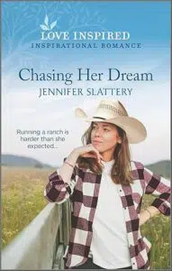 Book Cover with Woman standing, elbow on fence, cowboy hat on her head.