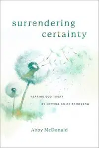 Book cover with a dandelion blowing seeds in the wind. The Book title is Surrendering Certainty by Abby Mcdonald.